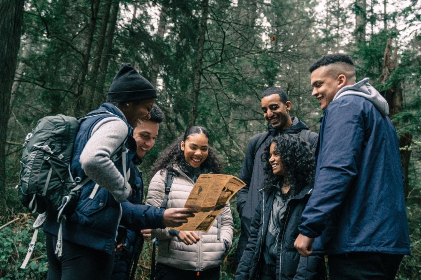 Friends hiking together in the forest
